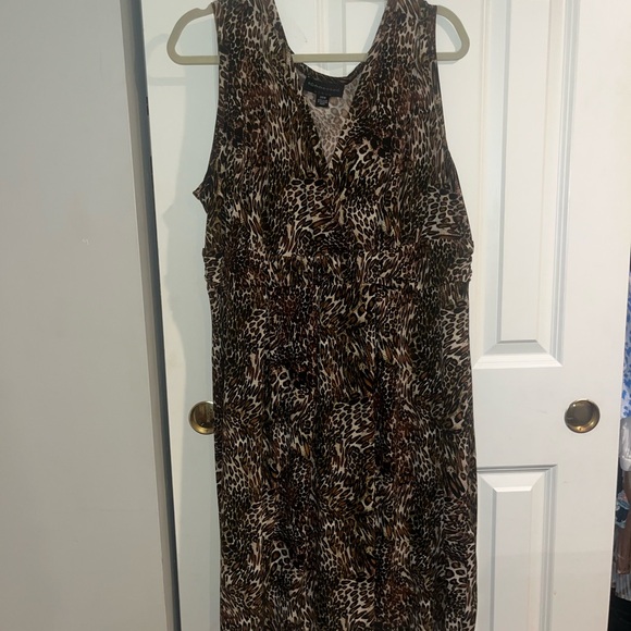 Brown and black leopard print dress with a v neckline and ruffle trim - Picture 1 of 3
